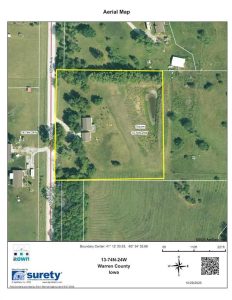 Aerial map of a rural property in Warren County, Iowa, outlined in yellow, showing a house, a driveway, a pond, trees, and surrounding grassy land. North is at the top; a road runs along the left edge.